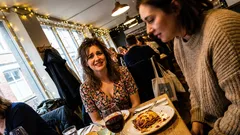 Short story: The restaurant manager leaned in and quietly questioned who I really was